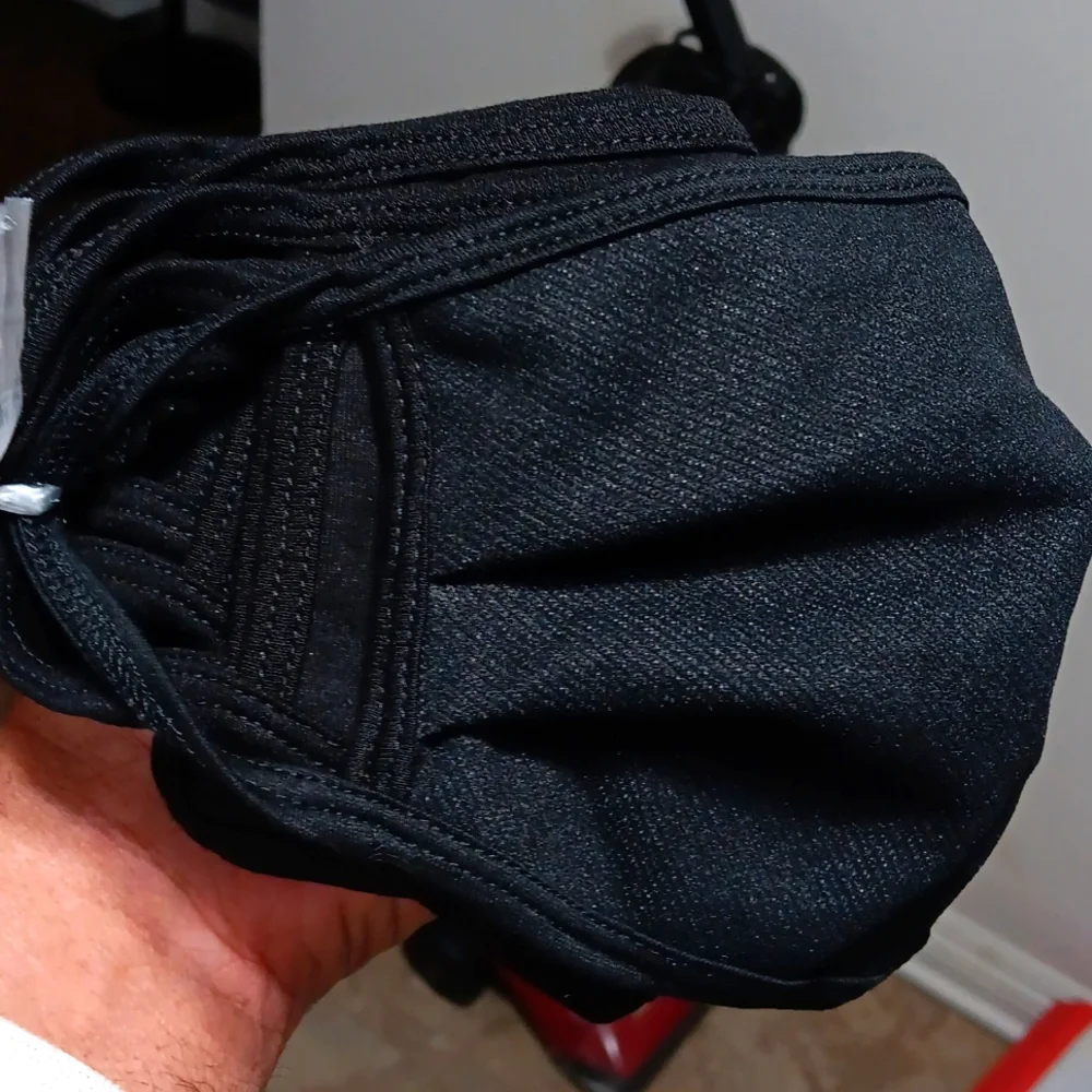 Stack Of 9 Reusable Black Face Masks